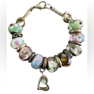 Classy gold tone snake chain bracelet with multicolored charms & a dangle heart